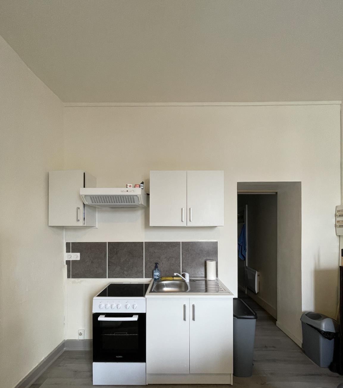 Appartement-1-sejour-cuisine-St-Sylvestre AMGH Immobilier 