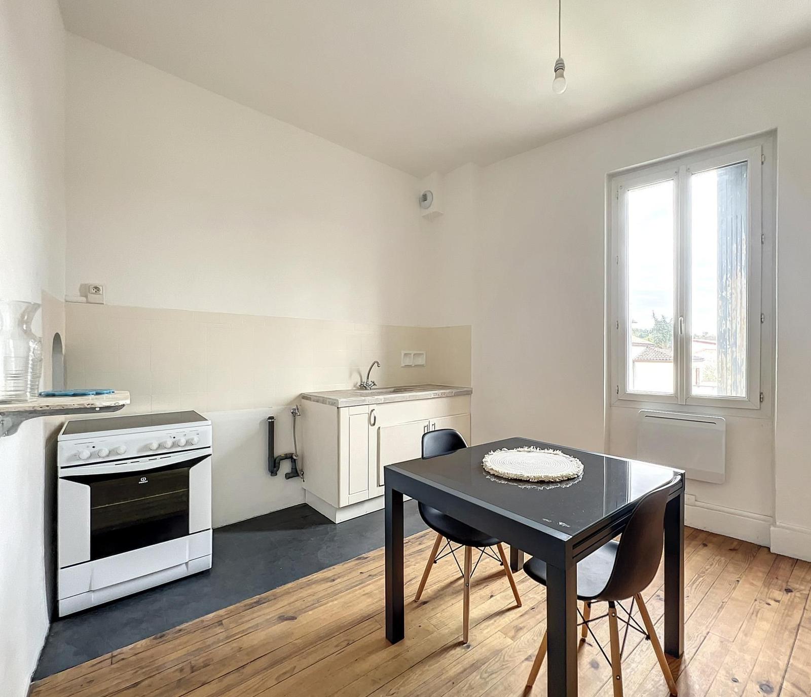 Appartement-2-sejour-cuisine-St-Sylvestre AMGH Immobilier