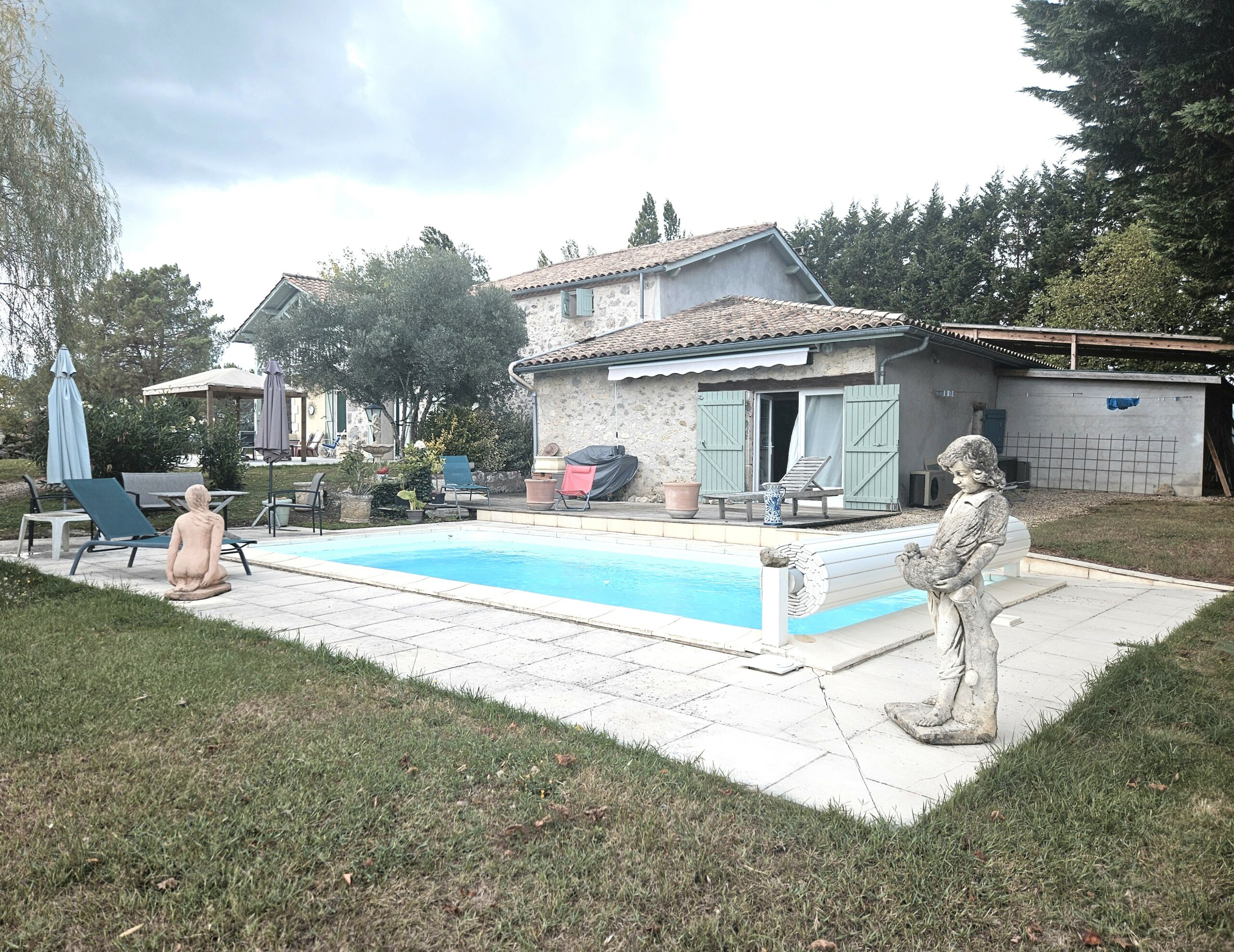 belle-maison-pierre-Anzex-Castejaloux-Piscine-terrasse-AMGH-IMMOBILIER