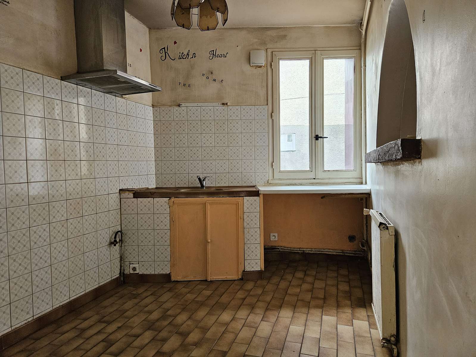 Cuisine-separee-maison-investisseur-Le-Passage